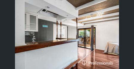 Spacious 4-Bedroom Family Home with Multiple Living Areas - Photo 4