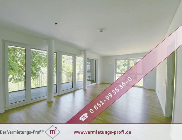 Energieeffiziente Wohnung mit direktem Moselblick – 2-Zimmer-Wohnung mit großzügiger Terrasse, Einbauküche & Tiefgaragenstellplatz - Photo 1