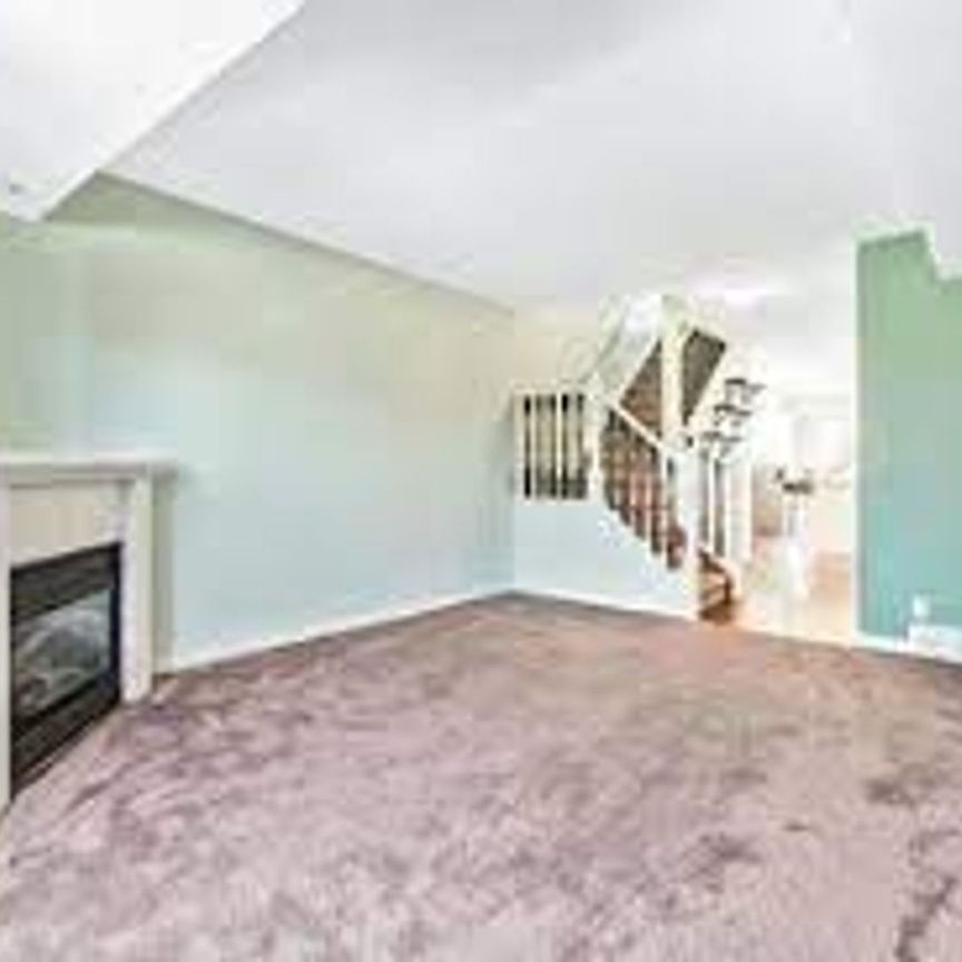 Move-In Ready 2-Bedroom Townhouse in the Heart of Downtown Okotoks - Photo 1