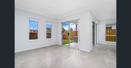 Modern Family Home with Multiple Living Spaces - Prime Gainsborough Greens Location - Photo 3