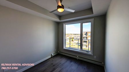 BRAND NEW 2 BED, 2 BATH 4TH (TOP) FLOOR APARTMENT W/AN UNDERGROUND PARKING STALL IN THE COMMUNITY OF SHAWNEE SLOPES, CALGARY - Photo 2
