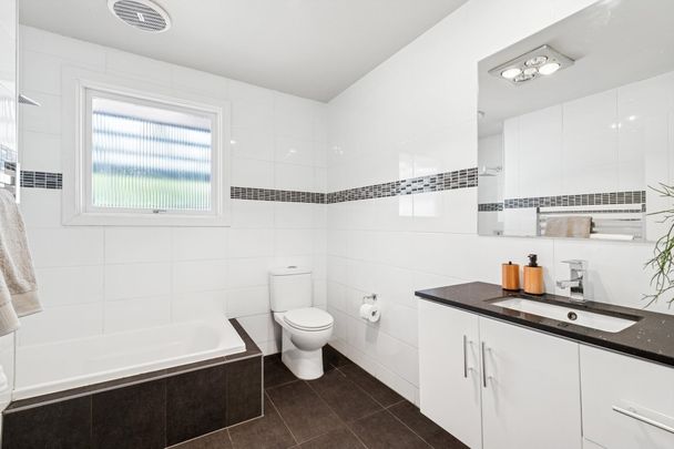 4-Bedroom Family Home with Modern Comforts - Photo 1