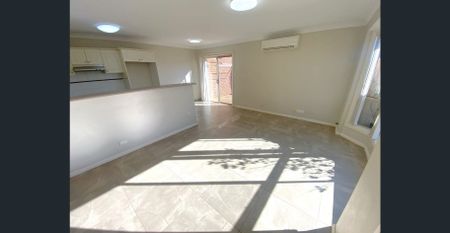 Townhouse located in quiet family friendly location - Photo 2