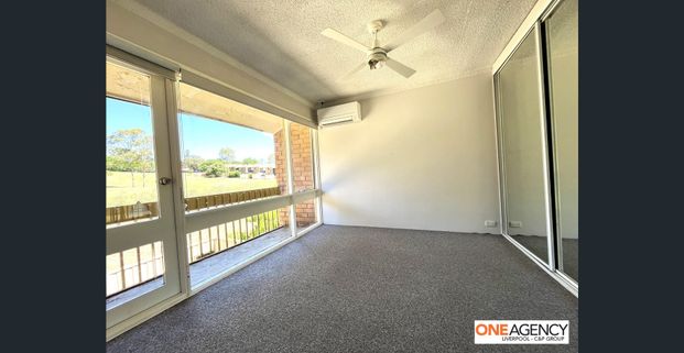 Neat & Convenient Living in a Great Location! - Photo 1