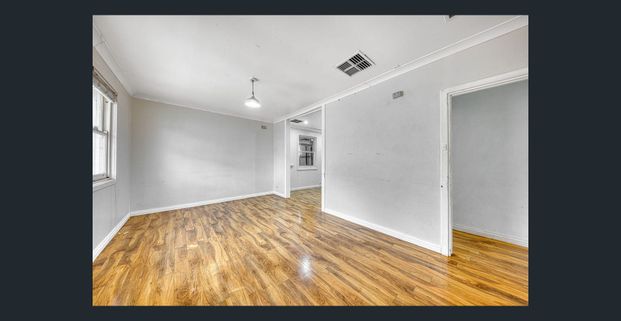 Spacious 3 Bedroom 1 Bathroom Home in Prime Location - Photo 1