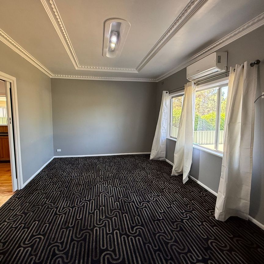 Freshly Painted Three Bedroom Home - Photo 1