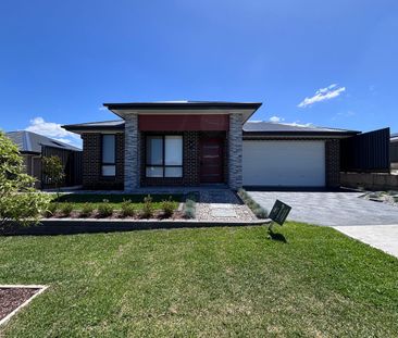 Brand New 4-Bedroom Home in Watagan Park - Photo 2