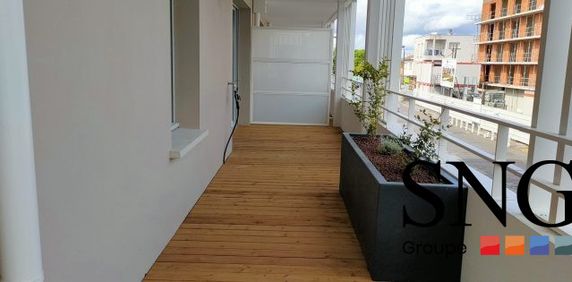 T3 AVEC TERRASSE ET PARKING - Photo 2