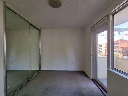 CONVENIENTLY LOCATED 2-BEDROOM UNIT FOR RENT - Photo 2