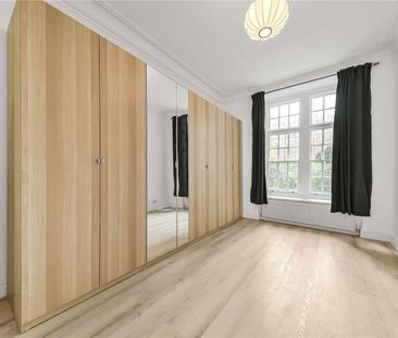A modern two double bedroom apartment on the ground floor of this mansion block on Maida Vale. - Photo 5