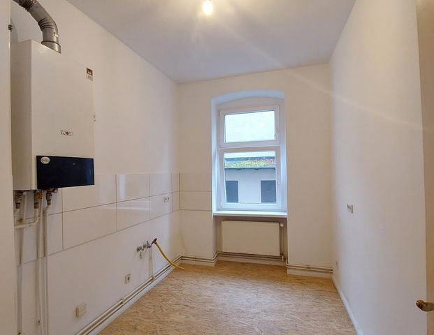 Ruhig wohnen, selbst gestalten: 1-Zimmer-Wohnung im Seitenflügel ab sofort verfügbar! - Photo 1
