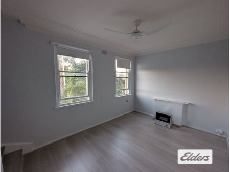 Spacious 2-Bedroom Duplex in Convenient Location - Photo 4