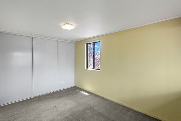 Well Maintained Townhouse with Convenience! Move in Now! - Photo 1