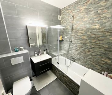 Charmant appartement de 4,5 pièces avec cachet au rez-de-chaussée - Photo 4