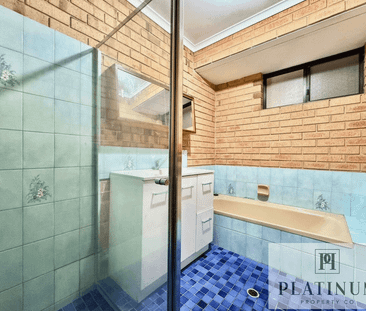 Comfortable, Light-Filled Living in a Family-Friendly Location - Photo 4