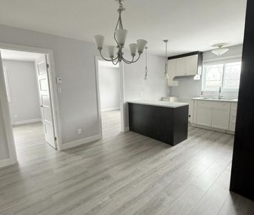 Grand 5½ rénové, 3 chambres, clim, 2 stationnements + rangement pri... - Photo 3
