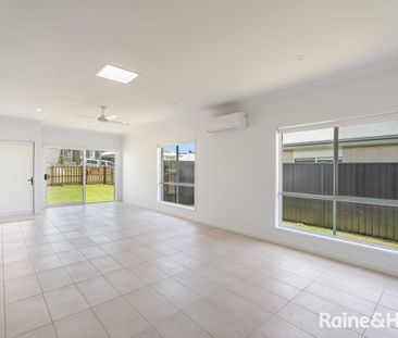 Modern Three-Bedroom Home in a Prime Location - Photo 2