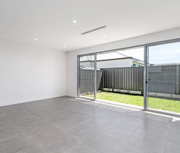 Modern Three bedroom Two Bathroom home in Wanted Locale - Photo 2