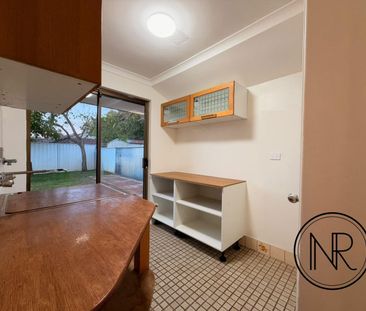 Large Family Home Within WSHS and Oberthur Primary School Zone! - Photo 5