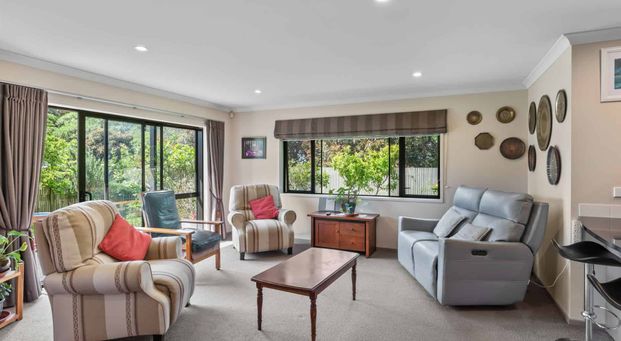 Spacious Four-Bedroom Home with Multiple Living Areas and Private Garden Retreat - Photo 1