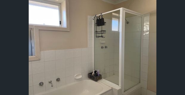 Furnished 2-bedroom Unit in the heart of town - Photo 1