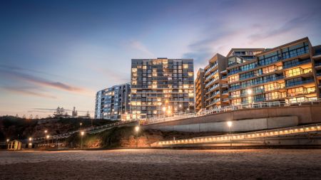Air-conditioned apartment with city views, located across from Newcastle beach. - Photo 2