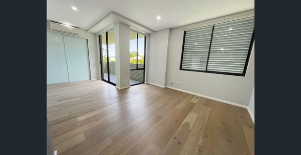 Modern Two Bedroom Unit - 20% Below Market Rent - Photo 1