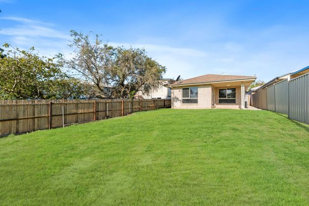Coastal Comfort Awaits: Your Modern Haven in Woody Point - Photo 1