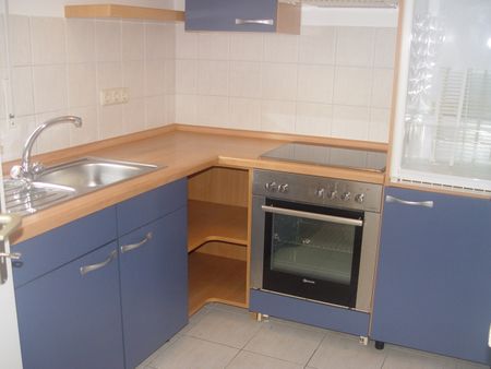 Geräumige Souterrainwohnung - Foto 5