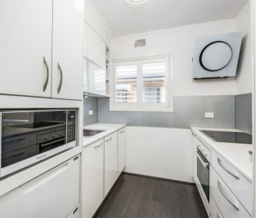 Ground Floor Apartment with Serene Water Views in Prime Location - Photo 4