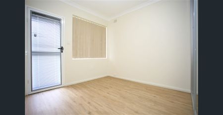 Modern 2 bedroom unit with garage - Photo 4