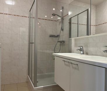 Centraal gelegen appartement met 2 slaapkamers en garagebox! - Photo 4