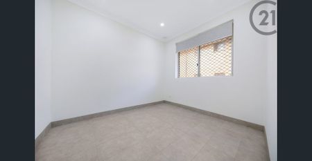 A Sunny 2-Bedroom in a Boutique Complex - Photo 2