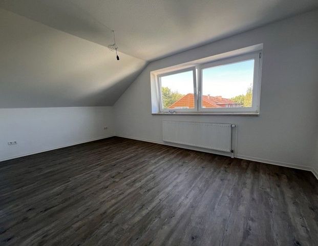 Gemütliche Wohnung mit Einbauküche! - Photo 1