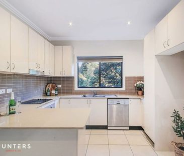 This large brick Duplex is perfect for the entertaining family - Photo 6