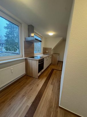 Helle 3-Zimmer-Dachgeschosswohnung mit offenem Wohn-/Küchenbereich in Eimke - Foto 1