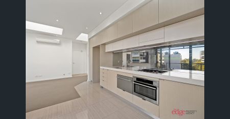 Sophisticated One-Bedroom Apartment with Abundant Natural Light - Photo 3