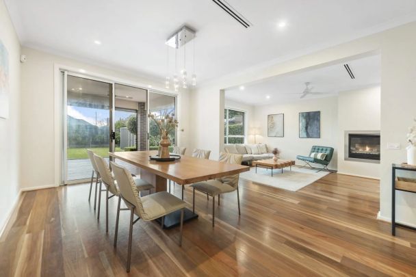 Prestige Family Home with Poolside Luxury & High-End Comfort - Photo 1