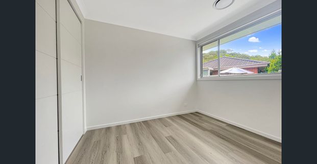 Modern, Light-Filled Home in a Prime Woy Woy Location - Photo 1