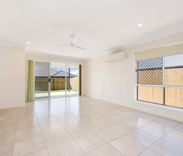 Family home with modern appliances in heart or Flagstone - Photo 1