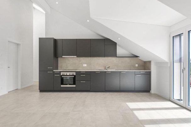 Appartement de 4,5 pièces aux combles dans un immeuble récent ! - Photo 1