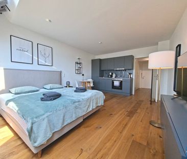 Vollmöblierte Dachgeschosswohnung mit Charme und Top-Anbindung in H... - Photo 1