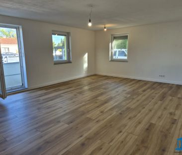Terrassen-Wohnung im Erdgeschoss mit Einbauküche und bis zu zwei PK... - Foto 2