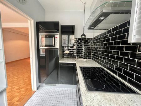 Ruim 2-slaapkamer appartement met terras (40m²) en autostaanplaats! - Foto 2