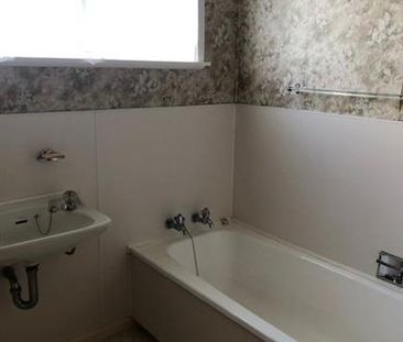 KOHI - SOLID BRICK & TILE HOME - Photo 5