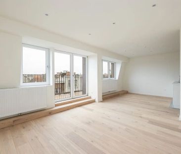 Lichtrijk 1-slaapkamerappartement met terras - foto 1