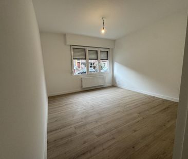 Gerenoveerd gelijkvloers appartement met tuin te huur - Foto 4