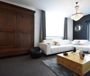 Knap gelijkvloersappartement met ruim terras en carport - Photo 5