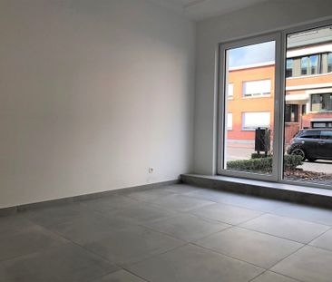 Gerenoveerd gelijkvloers appartement met 2 slaapkamers en tuin! - Photo 3