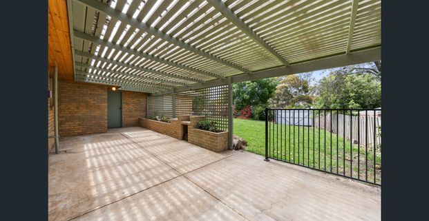 Refreshed Four-Bedroom Home With Gated Side Access - Photo 1